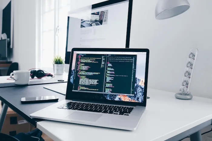 Laptop displaying custom code